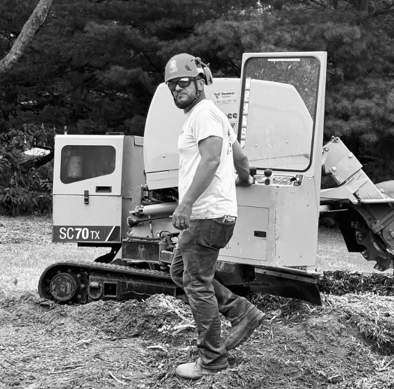 man holding a stump grinder scottsville ky